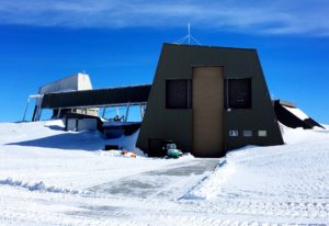 New antennas are assembled and maintained on the mountain in this large building, where antennas can be brought in and out via rails.